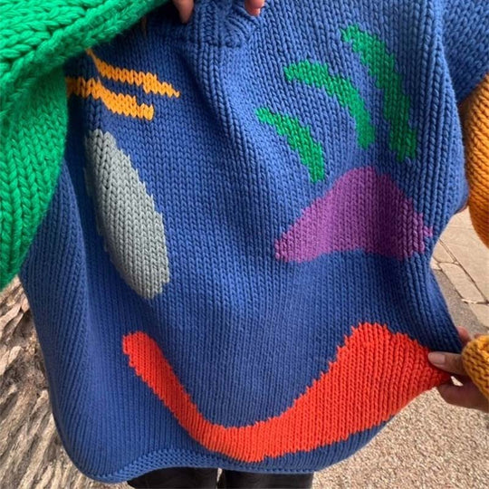 Lässiger Strickpulli mit Smiley-Motiv