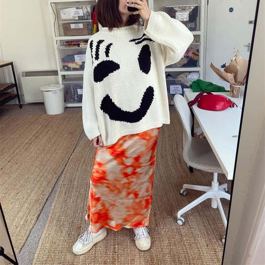 Lässiger Strickpulli mit Smiley-Motiv