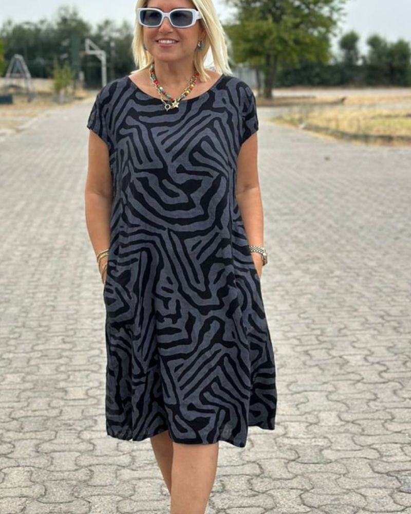 Elegantes Sommerkleid mit Rundhalsausschnitt und zeitlosem Print