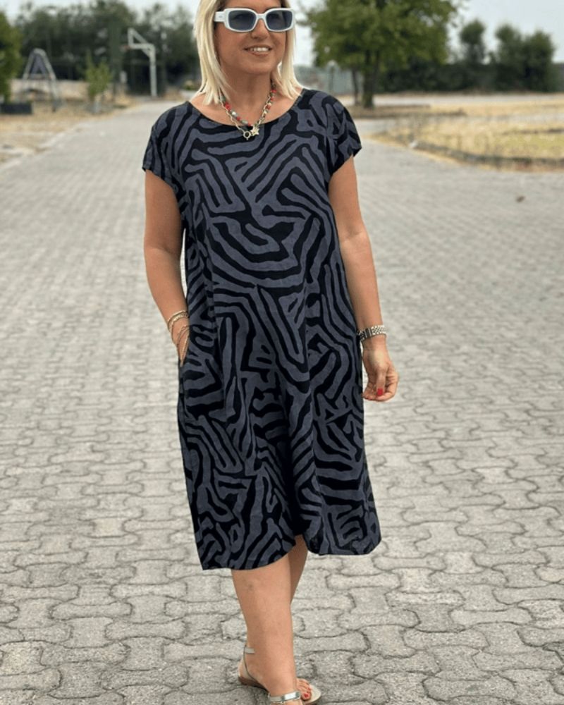 Elegantes Sommerkleid mit Rundhalsausschnitt und zeitlosem Print