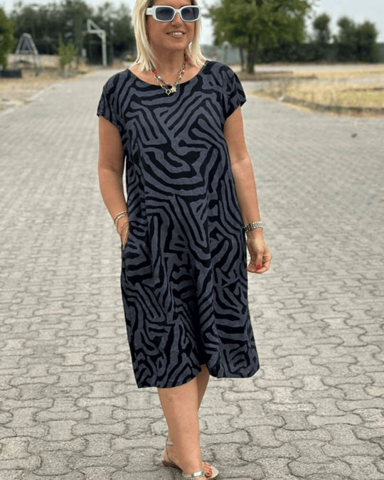 Elegantes Sommerkleid mit Rundhalsausschnitt und zeitlosem Print