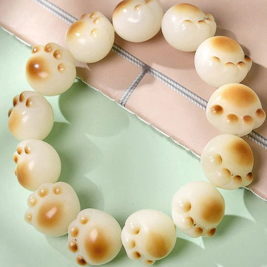 Perlenarmband mit Katzenpfotenmuster