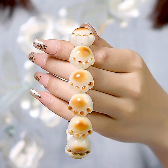 Perlenarmband mit Katzenpfotenmuster