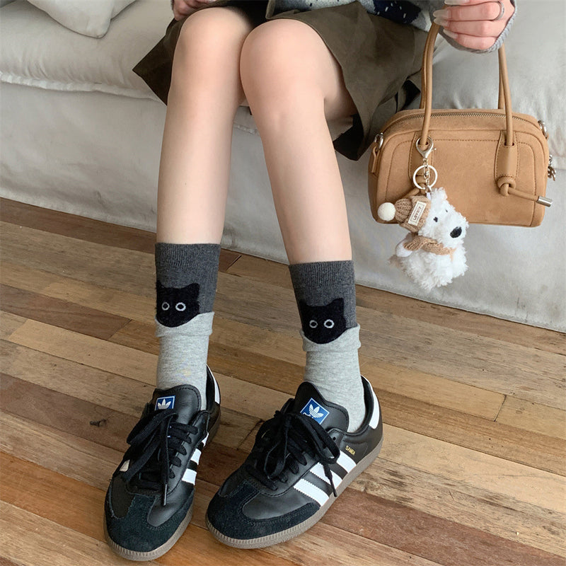 Kreative Katzenmuster-Socken