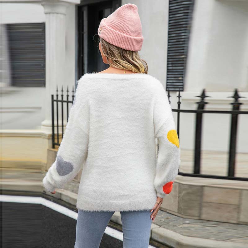 Pull mit Herzmuster aus Strick