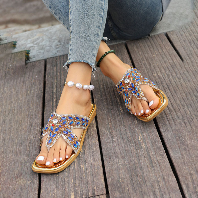 Mit Strass verzierte Hausschuhe