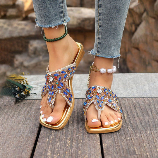 Mit Strass verzierte Hausschuhe