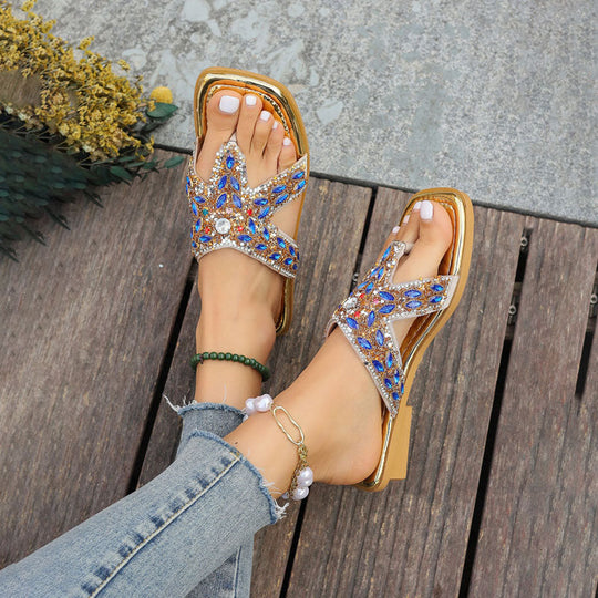 Mit Strass verzierte Hausschuhe